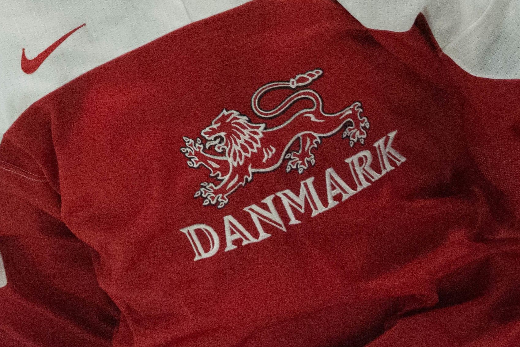 https://publish.dailyfaceoff.com/wp-content/uploads/2024/12/Denmark-Logo-Jersey.jpg