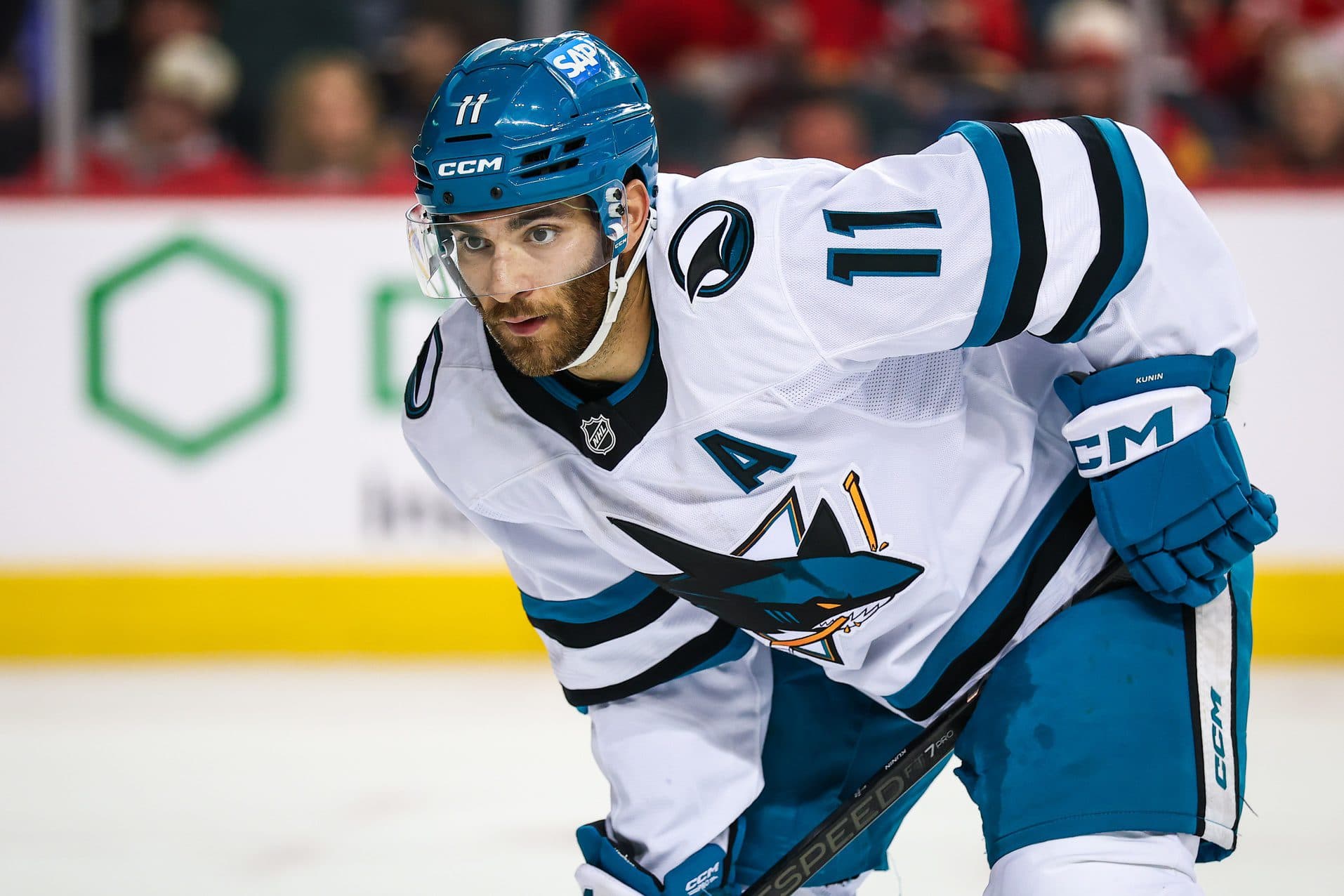 San Jose Sharks center Luke Kunin (11) during the face off against the Calgary Flames during the third period at Scotiabank Saddledome.
