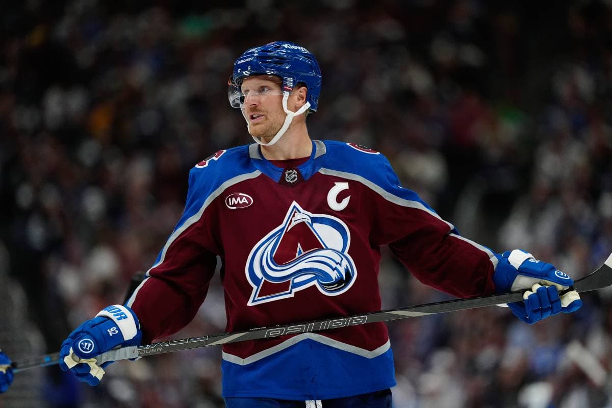 Avalanche’s Gabriel Landeskog helped off ice after crashing into Panthers’ net