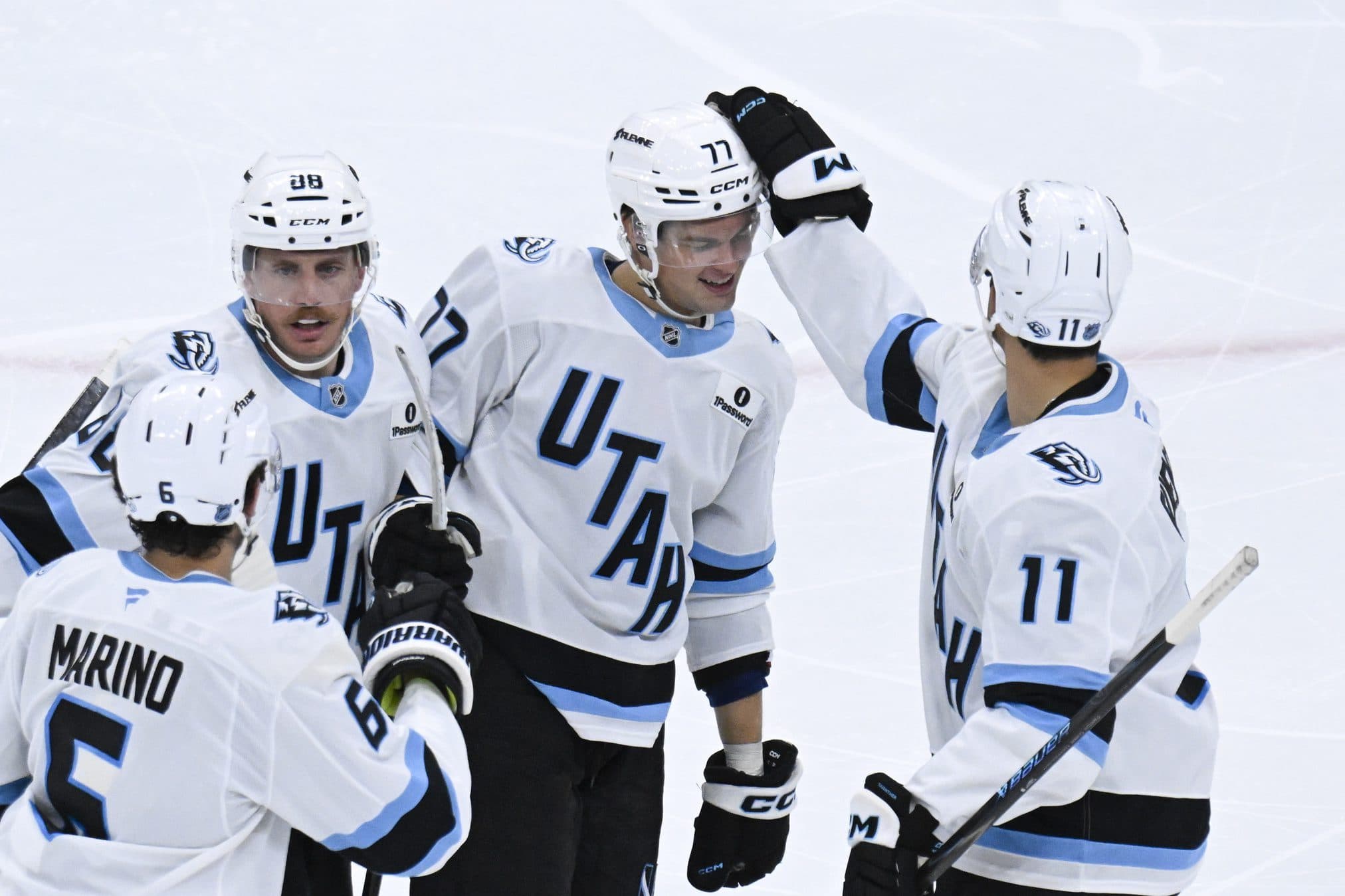 Utah Mammoth right wing JJ Peterka (77) celebrates with teammates after scoring a goal against the Chicago Blackhawks during the third period at United Center.