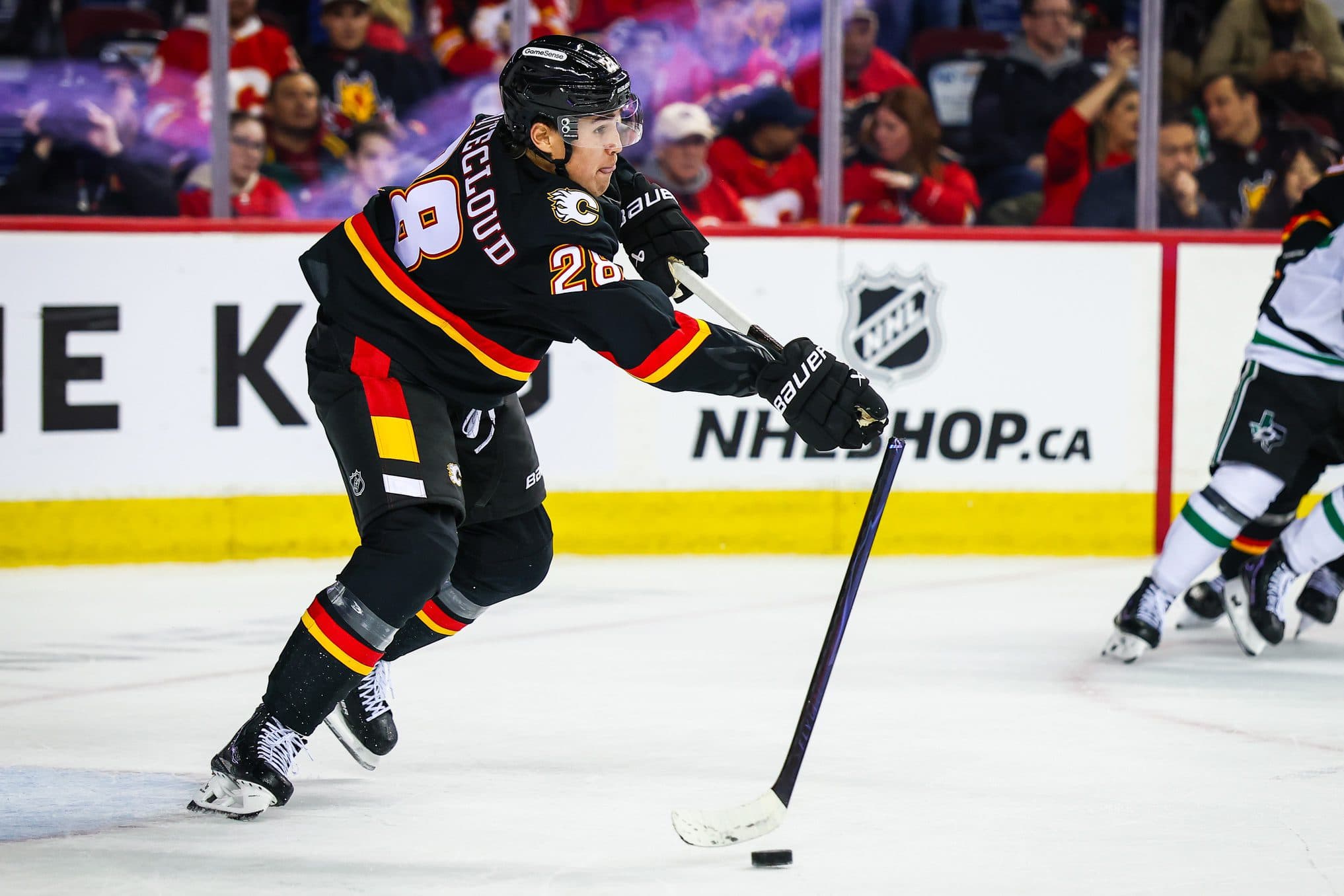 Flames’ Zach Whitecloud exits game with upper-body injury