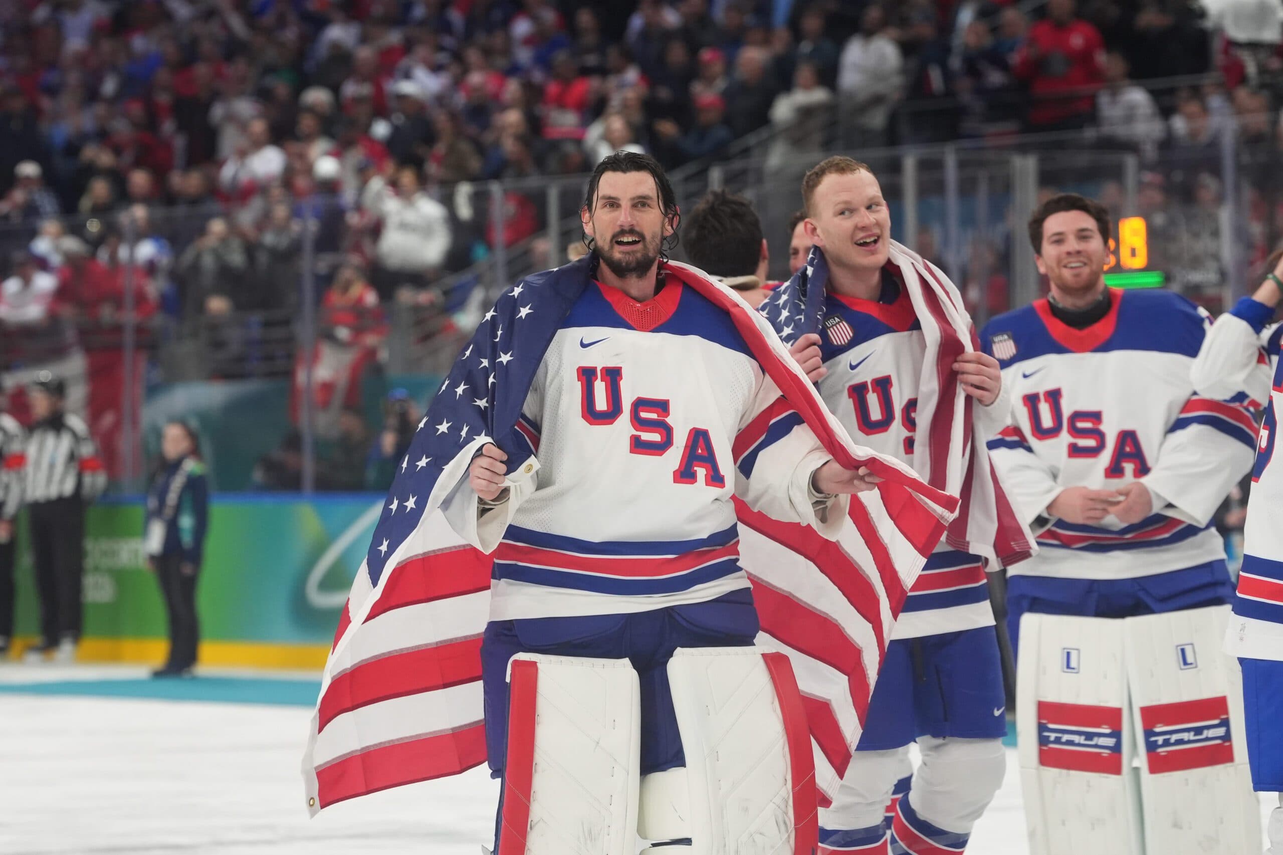 Connor Hellebuyck, Brady Tkachuk and Jeremy Swayman