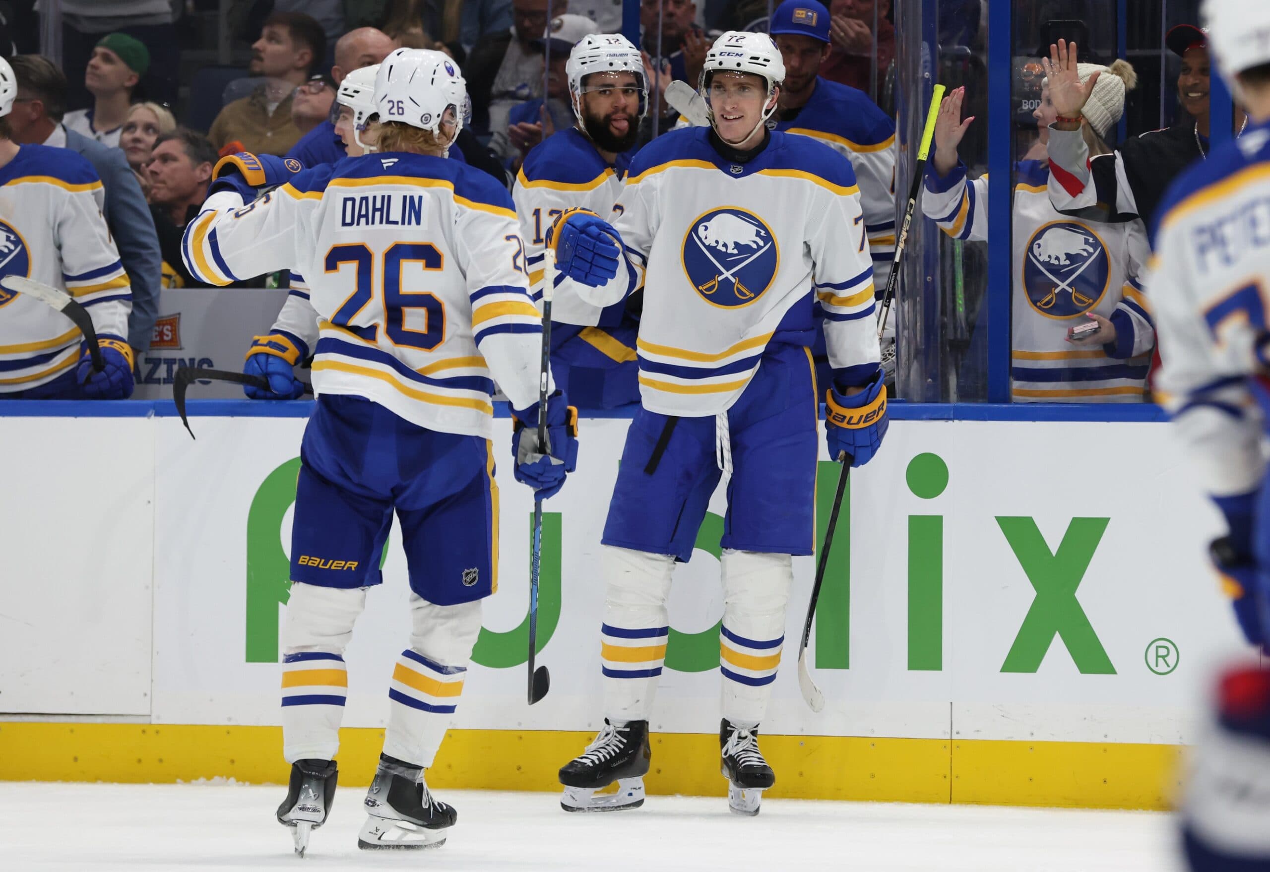 Buffalo Sabres center Tage Thompson (72) is congratulated by defenseman Rasmus Dahlin (26) after he scored a goal against the Tampa Bay Lightning during the second period at Amalie Arena.