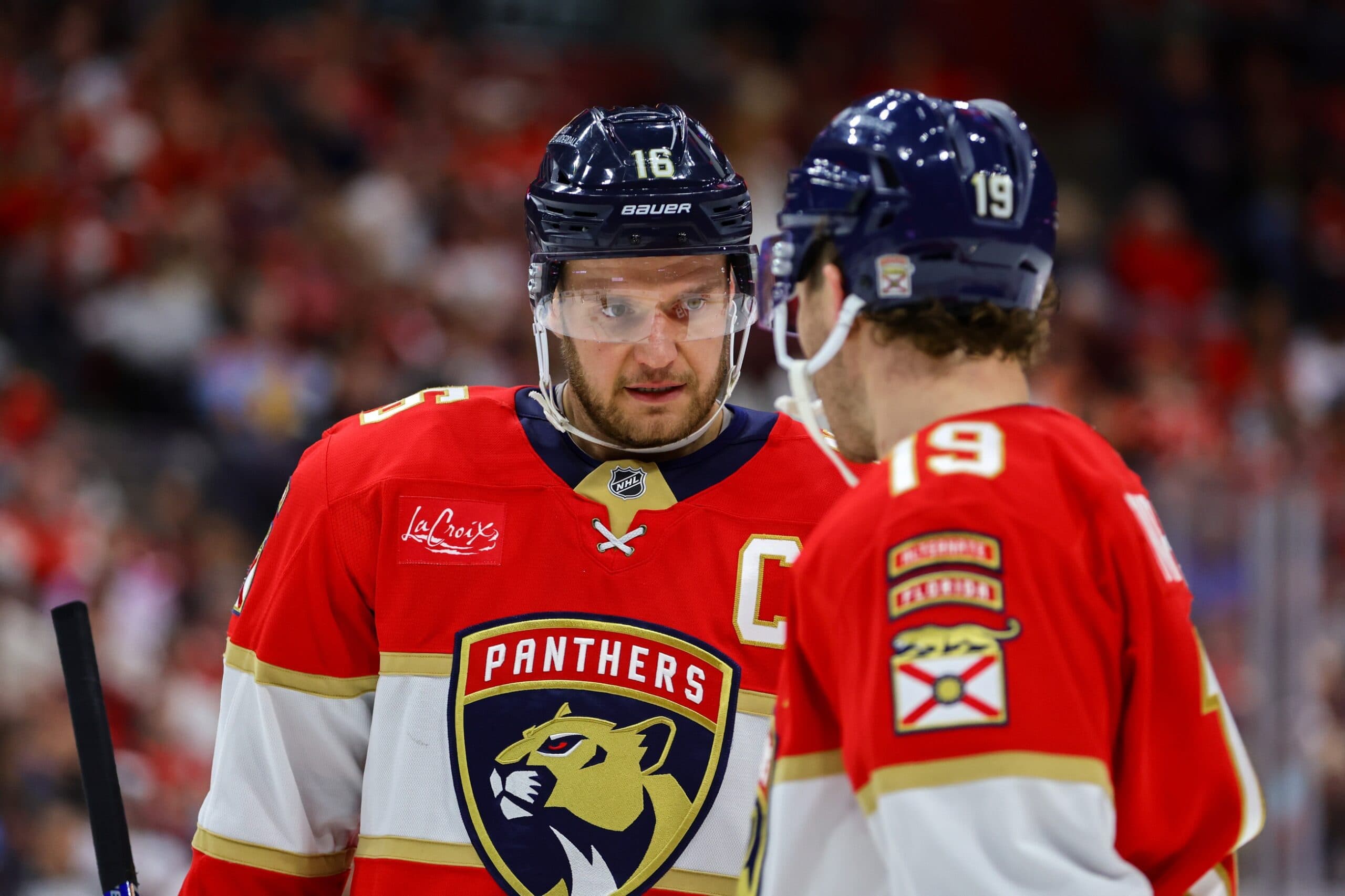 Florida Panthers center Aleksander Barkov (16) talks to left wing Matthew Tkachuk (19) during the second period against the New Jersey Devils at Amerant Bank Arena.
