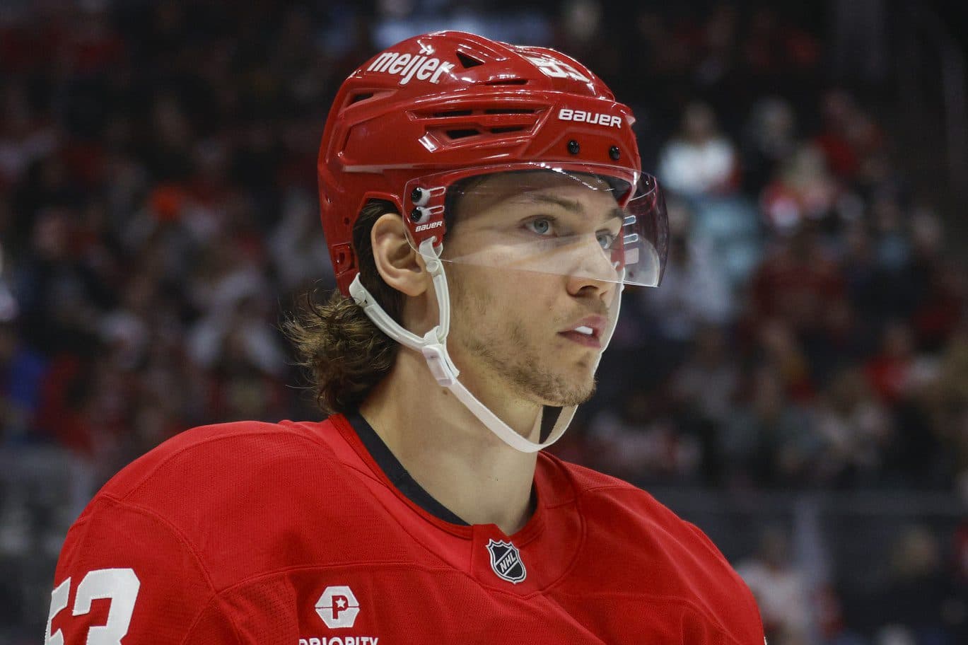 Detroit Red Wings defenseman Moritz Seider (53) looks on during the first period of the game against the New Jersey Devils at Little Caesars Arena.