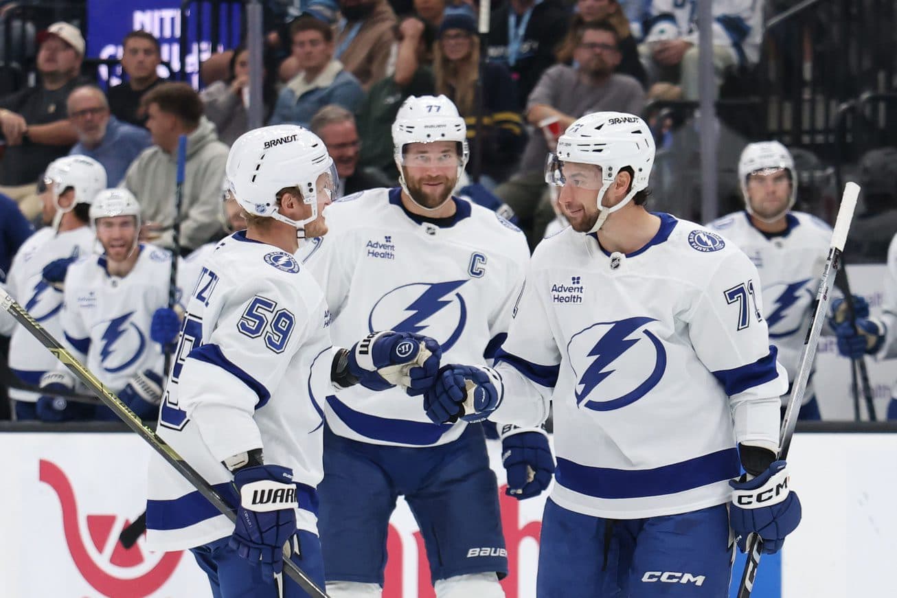 Tampa Bay Lightning center Anthony Cirelli (71) celebrates scoring a goal against the Utah Mammoth during the second period with center Jake Guentzel (59) and defenseman Victor Hedman (77) at Delta Center.