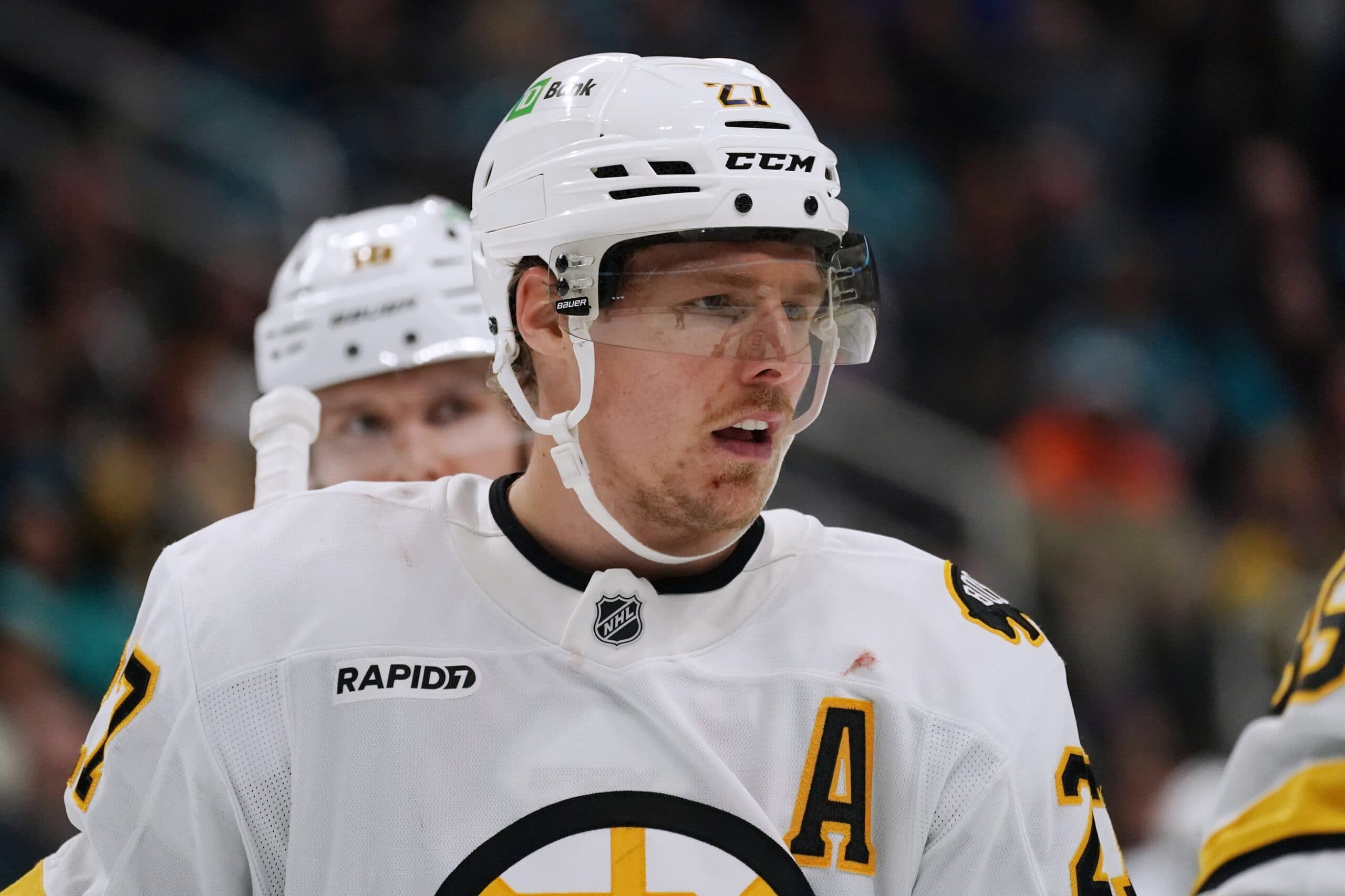 Boston Bruins defenseman Hampus Lindholm (27) waits for play to resume against the San Jose Sharks in the third period at SAP Center in San Jose.