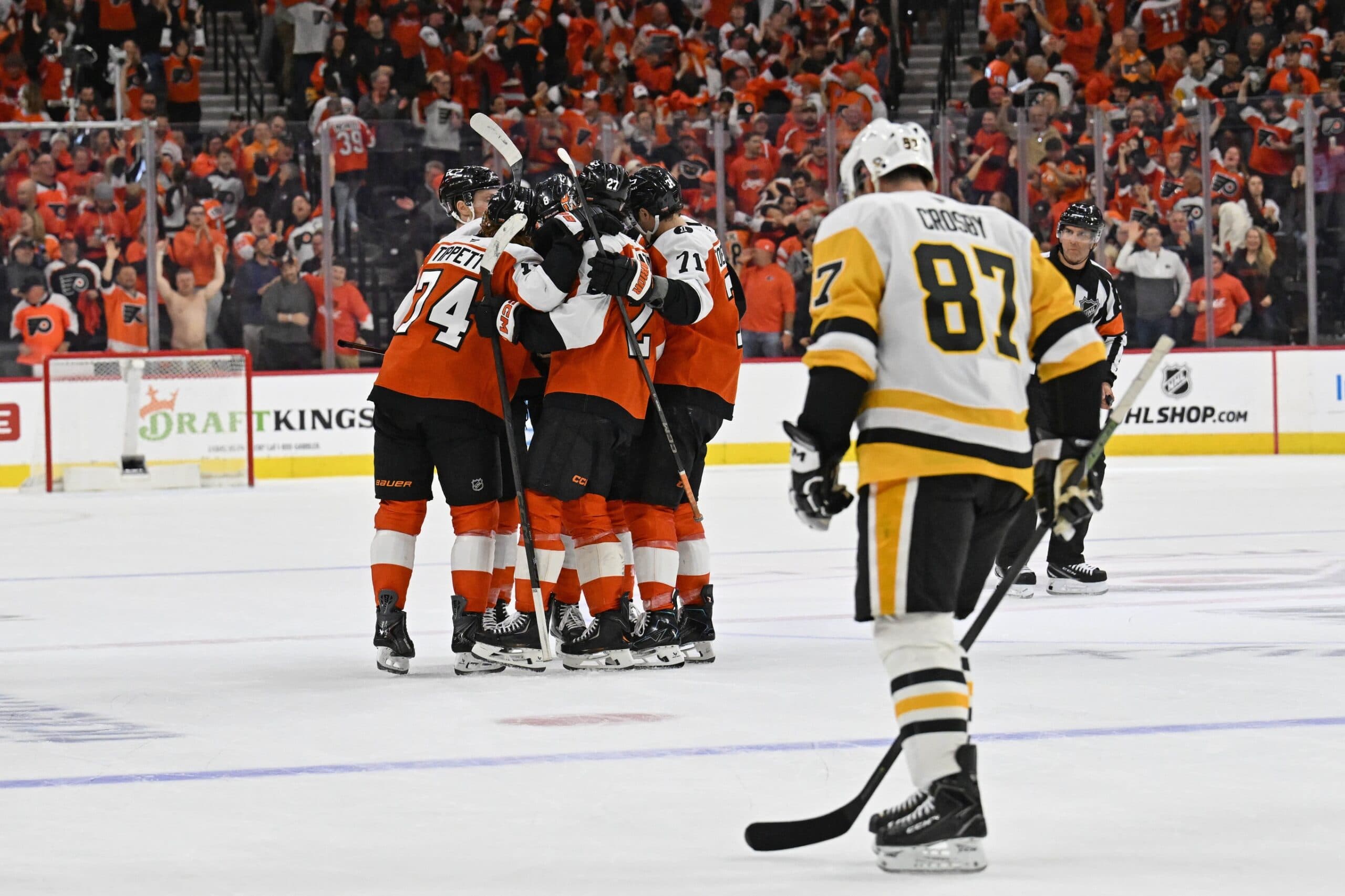 Philadelphia Flyers right wing Owen Tippett (74) celebrates his empty goal with teammates against Pittsburgh Penguins center Sidney Crosby (87) during the third period in game three of the first round of the 2026 Stanley Cup Playoffs at Xfinity Mobile Arena.